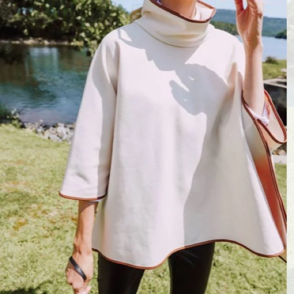 Ivory Pearl Leather Trim Funnel Neck Piper Poncho
TUCKERNUCK - Picture 2 of 8